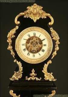 Rococo Mantle Clock. Ebonised Wood and Brass ca.1900  