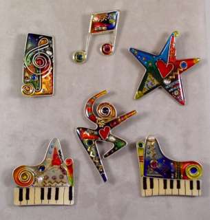 One picture shows more Yossi Steinberg pins that we have listed 