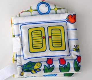 Two of the cutest fabric baby books ever One is a house shaped photo 