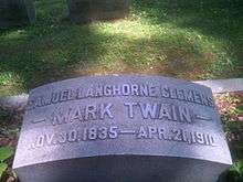 Mark Twain headstone in Woodlawn Cemetery .