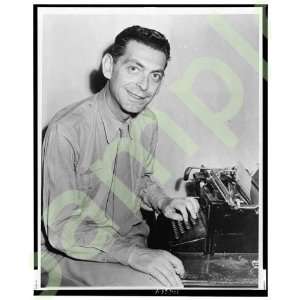  Edward Kennedy seated at typewriter 1945