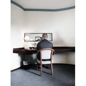  Rear View of a Mid Adult Man Sitting in a Hotel Room in 