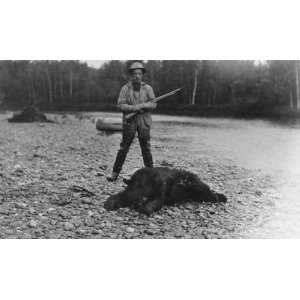  Hunter with bear which he killed