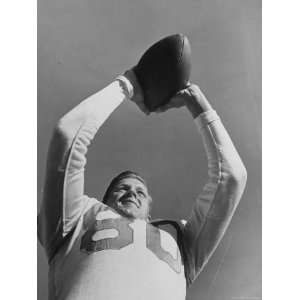  University of Texas Football Player Malcolm Kutner Holding 