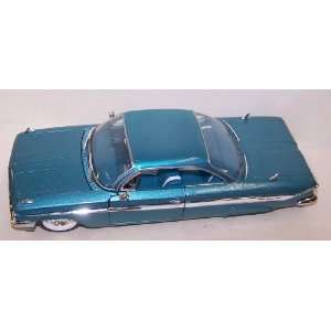 Jada Toys 1/24 Scale Diecast Showroom Floor 1961 Chevy Impala in Color 