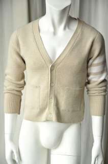 Thom Browne cashmere cardigan, with a longer back panel, jaunty arm 