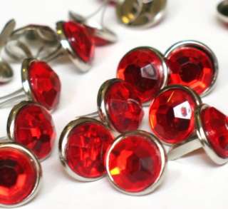12 pieces of 12mm round crystal brads in red. Great for scrapbooking 
