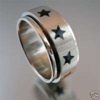 NEW STAINLESS STEEL SPINNER RING WITH BLACK STARS Sz 6  