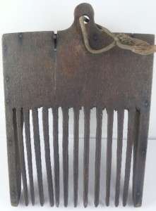 Nice wooden comb. Used as a tool to pick blueberries. Approx. measure 