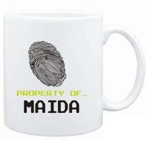 Mug White  Property of _ Maida   Fingerprint  Female 