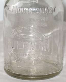Set of 8 matched Huffman Glass Automotive Oil Bottles in original rack 
