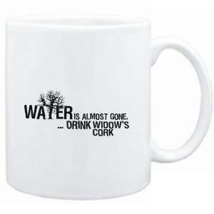  Mug White  Water is almost gone  drink Widows Cork 