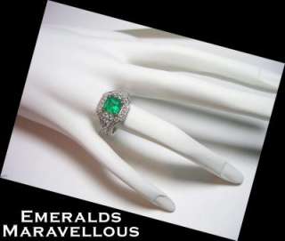   fascinating natural vibrant green emeralds and scintillating diamonds