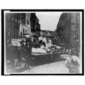  Bodies,dead men loaded on cart in a Mexican town,c1915 