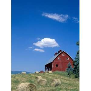  Red Barn with Rolled Hay Bales, Potlatch, Idaho, USA 