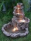 large lighted outdoor garden yard water fountain  