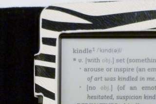 touch model kindle shown in photo s below is not included in auction