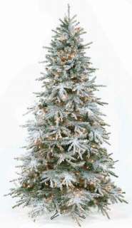This artificial Christmas tree is slim and snow covered. The sparse 