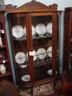 Circa 1900 Oak China Cabinet with curved glass Art Nouveau Carving 