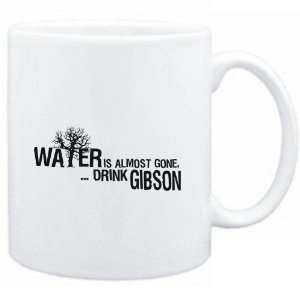 Mug White  Water is almost gone  drink Gibson  Drinks  