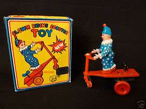 Clown Riding Scooter Wind Up Tin Toy New in Box  