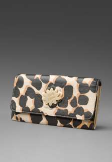 SEE BY CHLOE Ring Around Long Wallet in Black Flower at Revolve 