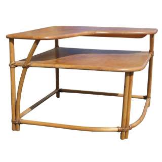   table features wood construction bamboo legs with rattan joints add a