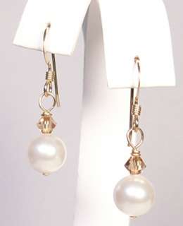   golden shadow materials 8mm white swarovski pearl and 4mm golden