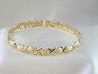 18k GP BANGLE BRACELET SZ SM / MED HEARTS & HUGS