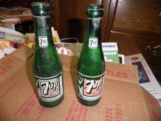 TWO OLD 7UP BOTTLES W/ GIRL IN SWIM SUIT  